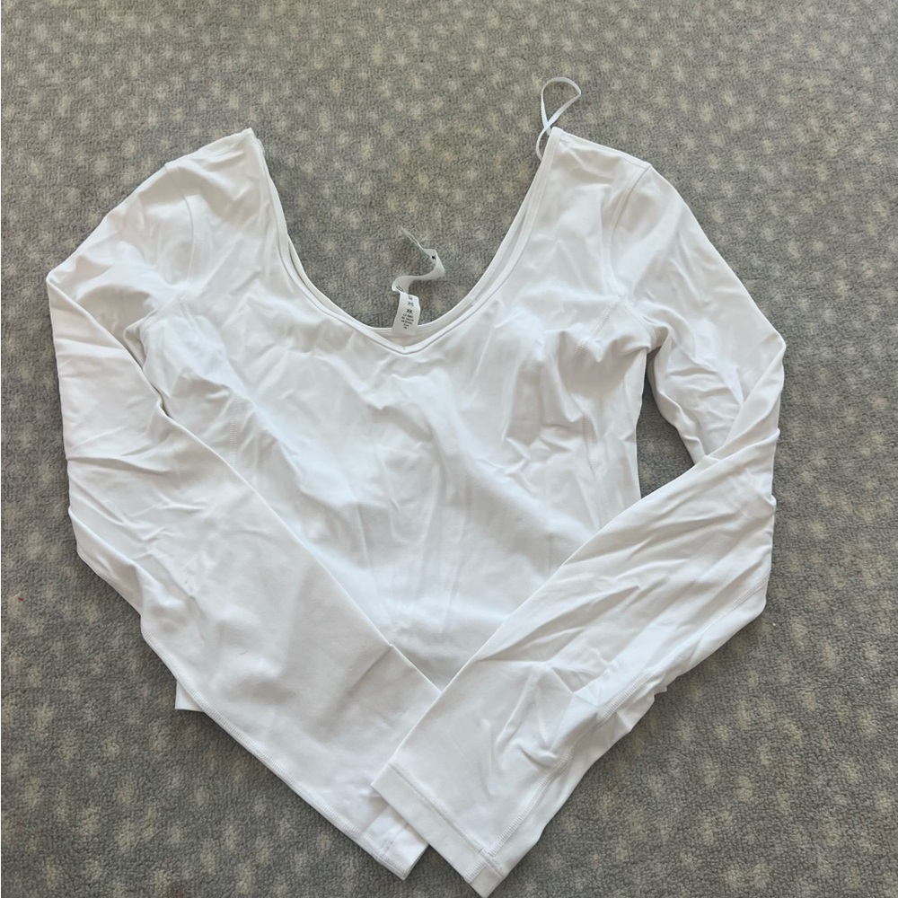 Lululemon Crop Ballerina top
Original owner 
Size 6